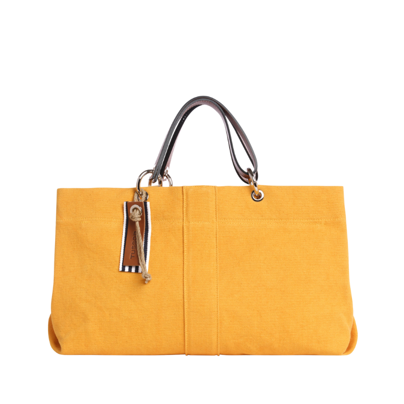 sac de ville modulable en coton jaune avec des anses en cuir naturel